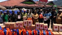 Kolaborasi Apkam dan Pemda Kabupaten Puncak Distribusikan Bansos Untuk Warga Gome Papua
