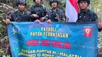 Jaga Kedaulatan Negara, Satgas Pamtas RI-Malaysia Yonarmed 10/ Bradjamusti Patroli Patok Batas Negara