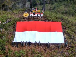 Habema Task Forces With Eromaga Residents Unfurled A Giant Indonesian Flag